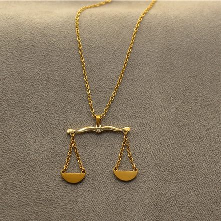 1 Shahbanoo Farah Pahlavi The scales of justice necklace